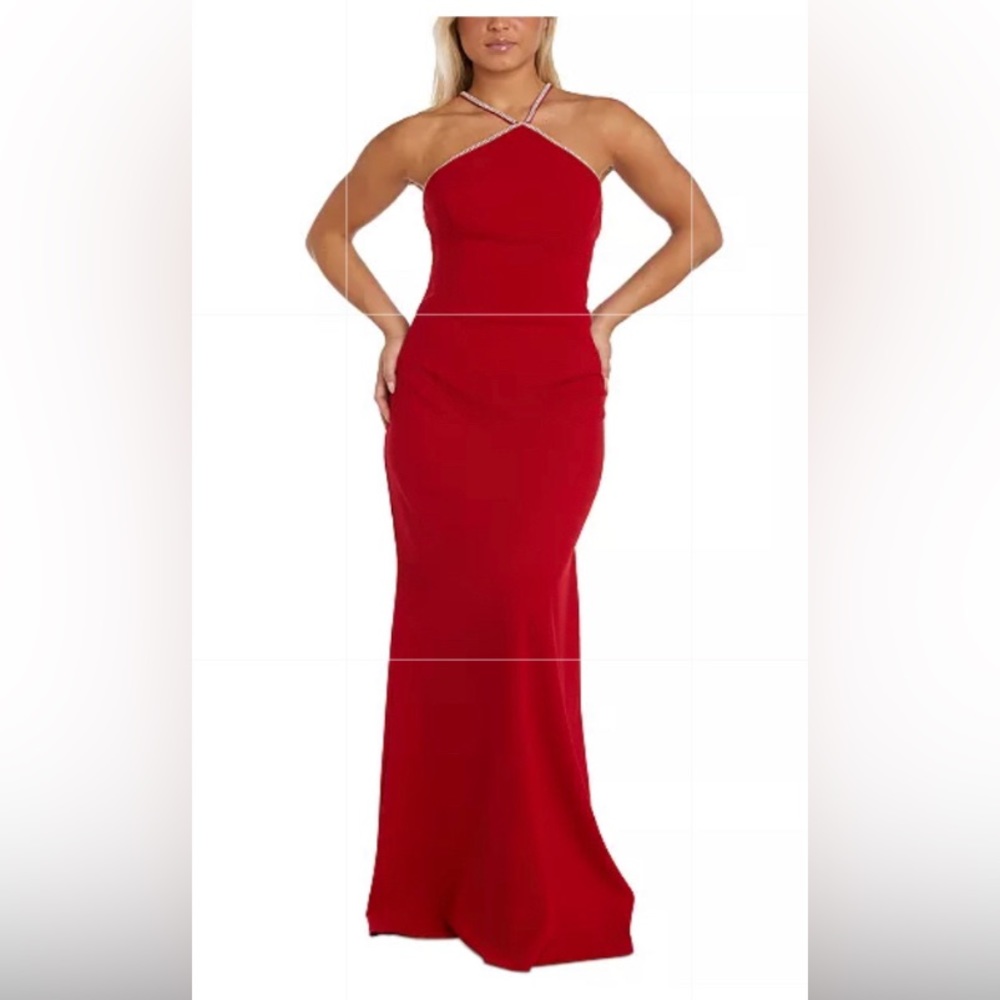 A long red dress with mini diamonds in a cross cross top along the neck